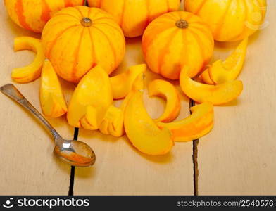 bunch of fresh yellow pumpkins just collected from garden