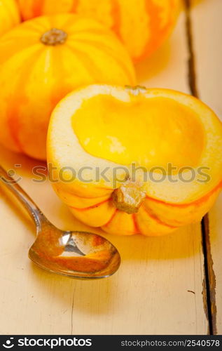 bunch of fresh yellow pumpkins just collected from garden