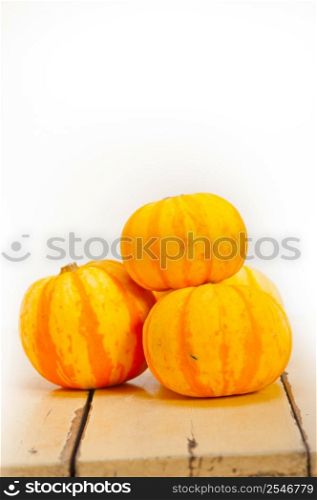 bunch of fresh yellow pumpkins just collected from garden