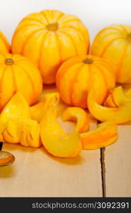 bunch of fresh yellow pumpkins just collected from garden