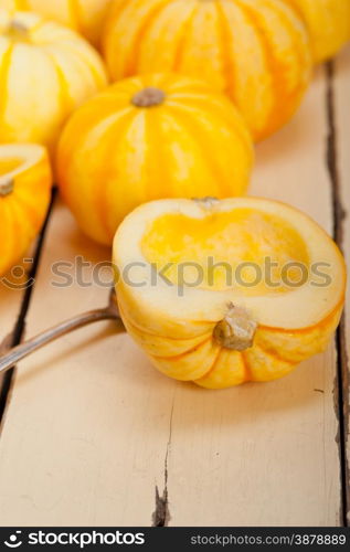 bunch of fresh yellow pumpkins just collected from garden