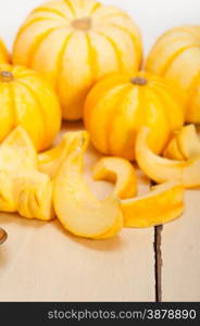 bunch of fresh yellow pumpkins just collected from garden