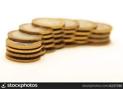Bunch of golden coins isolated on white background