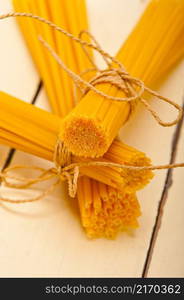 bunch of Italian pasta type on a white rustic table