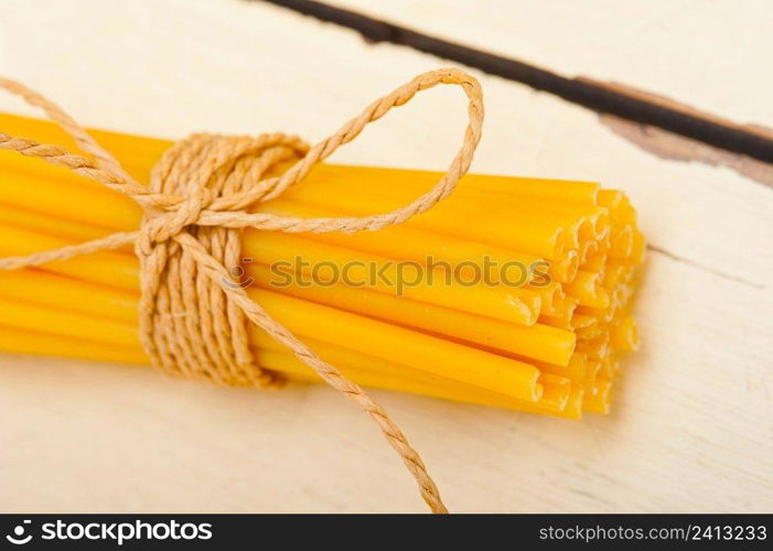 bunch of Italian pasta type on a white rustic table 