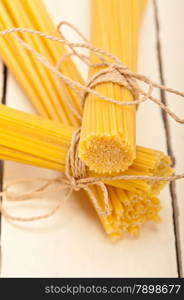 bunch of Italian pasta type on a white rustic table