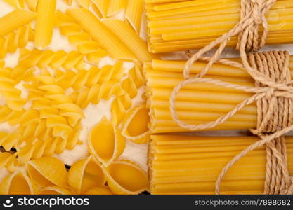 bunch of Italian pasta type on a white rustic table