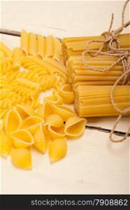bunch of Italian pasta type on a white rustic table
