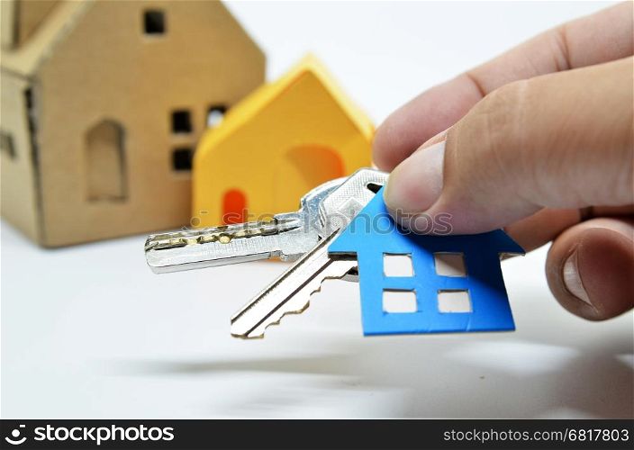 Bunch of keys with house shaped cardboard