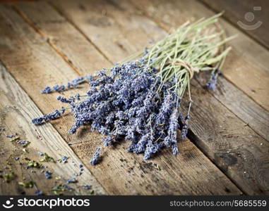 Bunch of lavender flowers on an old wood table