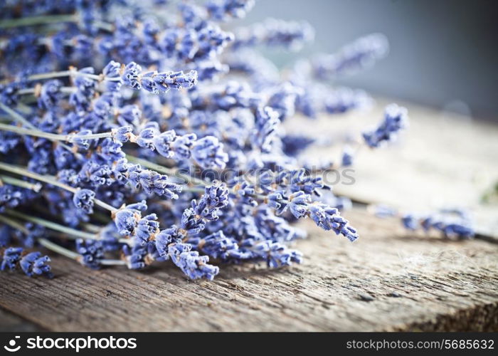 Bunch of lavender flowers on an old wood table