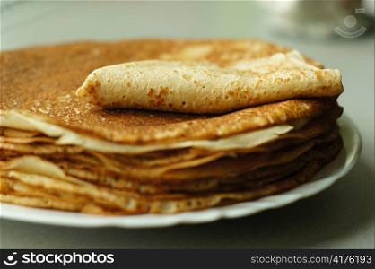 bunch of pancakes on a plate. mrivserg