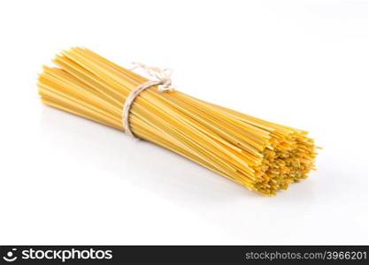 Bunch of raw italian pasta with vegetable dye of spinach, paprika and carrot