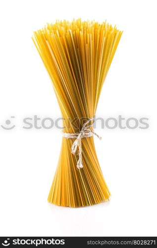 Bunch of raw italian pasta with vegetable dye of spinach, paprika and carrot