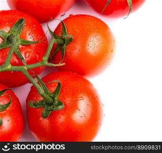 Bunch of red vine salad tomatoes on a white table