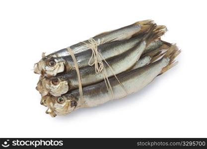 Bunch of smoked pearlsides fishes, Maurolicus muelleri, on white background