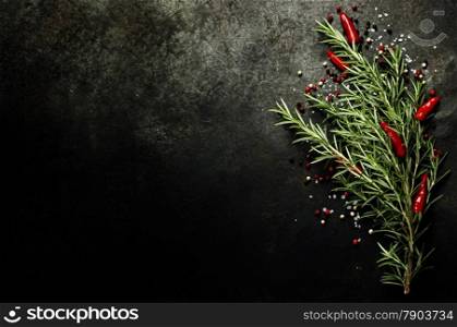 Bunch of spices on dark vintage background. Cooking, vegetarian food or health concept.
