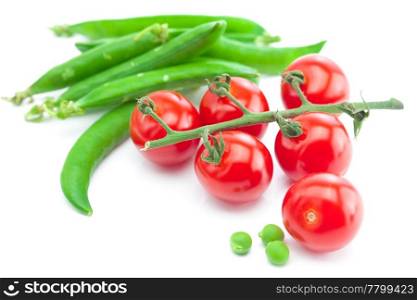 bunch of tomato and peas isolated on white