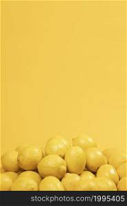 bunch raw lemons with copy space