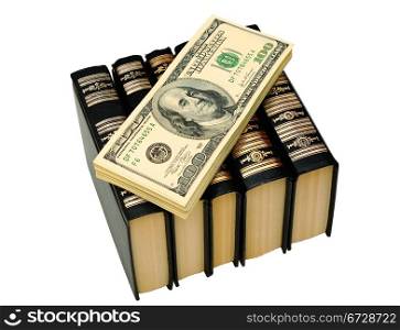 Bundle Of Dollars On The Books On White Background