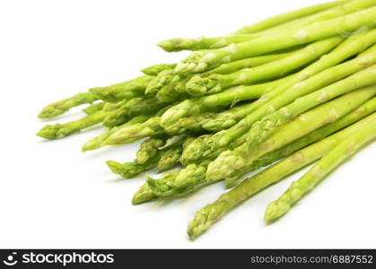 Bundle of green asparagus shoots isolated over white