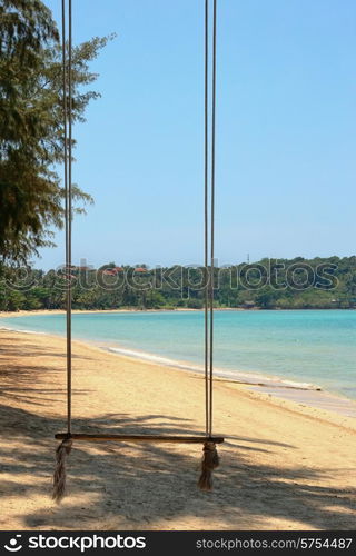 Bungee jumping on the beach of a tropical island