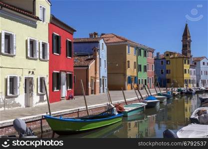 Burano is an island in the Venetian Lagoon, northern Italy. It is situated near Torcello at the northern end of the Lagoon, and is known for its lace work and brightly colored homes. Burano is situated 7 kilometres (4 miles) from Venice, a 40-minute trip by vaporetti.