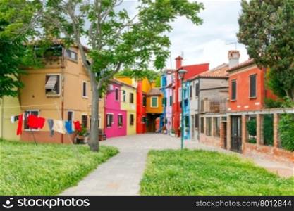 Burano, Italy - May 21 2015: The island in the lagoon near Venice. Famous tourist attraction. Famous for its colorful houses and lace.