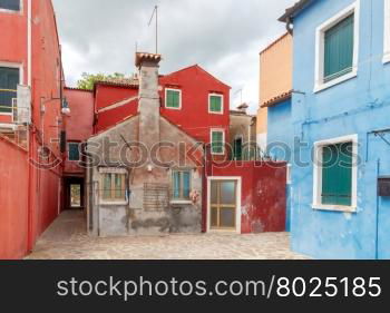 Burano. The island in the lagoon near Venice. Famous tourist attraction. Famous for its colorful houses and lace.. The island of Burano. Italy.