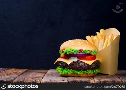 Burger and fries with copy space