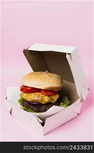 burger white box pink background