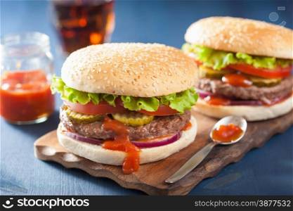burger with beef patty lettuce onion tomato ketchup