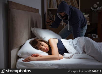 Burglar breaking into house at night to bedroom with sleeping woman. Burglar breaking into house at night to bedroom with sleeping wo