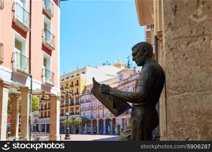 Burgos statue or the newspaper reader next to Plaza Mayor square in Castilla Spain