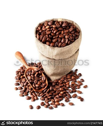 Burlap bag with coffee beans and wood scoop isolated on white background. Burlap bag with coffee beans and wood scoop