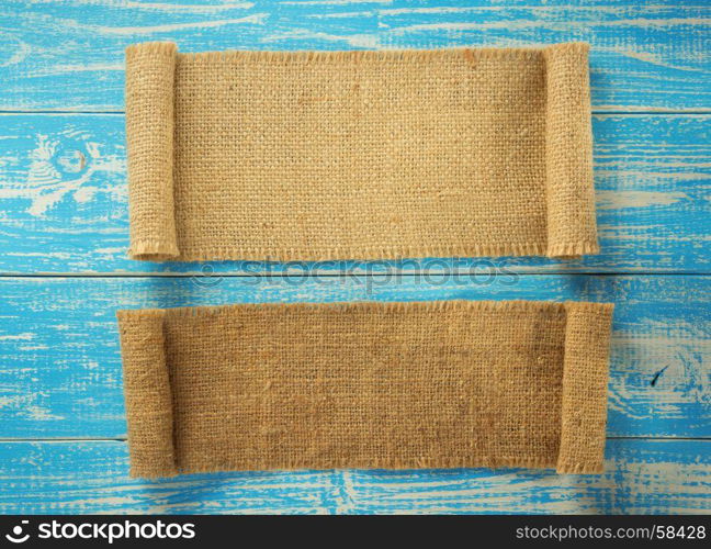 burlap hessian sacking on wooden background