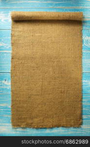 burlap hessian sacking on wooden background