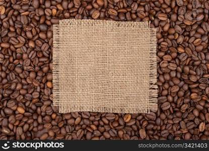 Burlap tag on the background of coffee