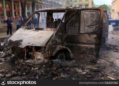 Burned car in the center of city after unrest in Odesa, Ukraine&#xA;