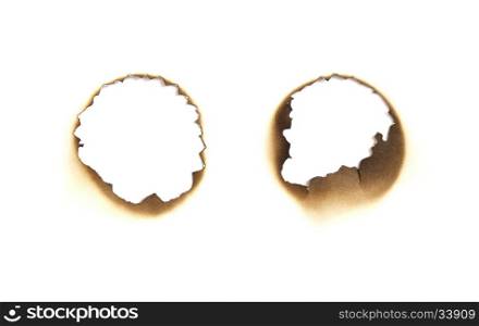 Burned paper hole