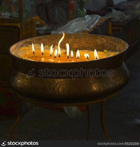 Burning candles in Drepung Monastery, Lhasa, Tibet, China