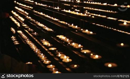 Burning candles in the St. Stephan cathedral, Vienna, Austria