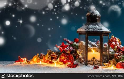 Burning candles , lantern and christmas decoration on magic bokeh lights background. Lantern and christmas decoration
