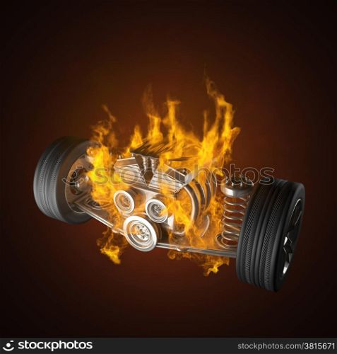 burning car chassis with engine and wheels