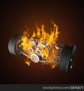 burning car chassis with engine and wheels