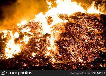 burning debris on a huge bonfire