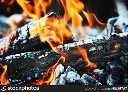 Burning down fire. embers and ashes
