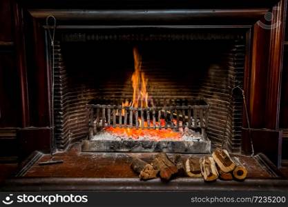 Burning logs in a Winter fireplace