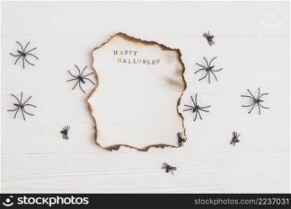 burning paper near ornamental spiders