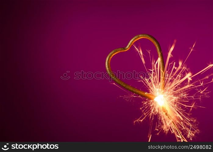 Burning sparkler in shape of heart. Wedding love Valentine&rsquo;s day banner.